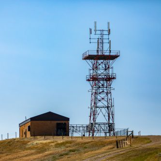 Hilltop cell site tower base station